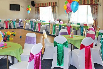 Wedding party table cluster balloons and venue dressing